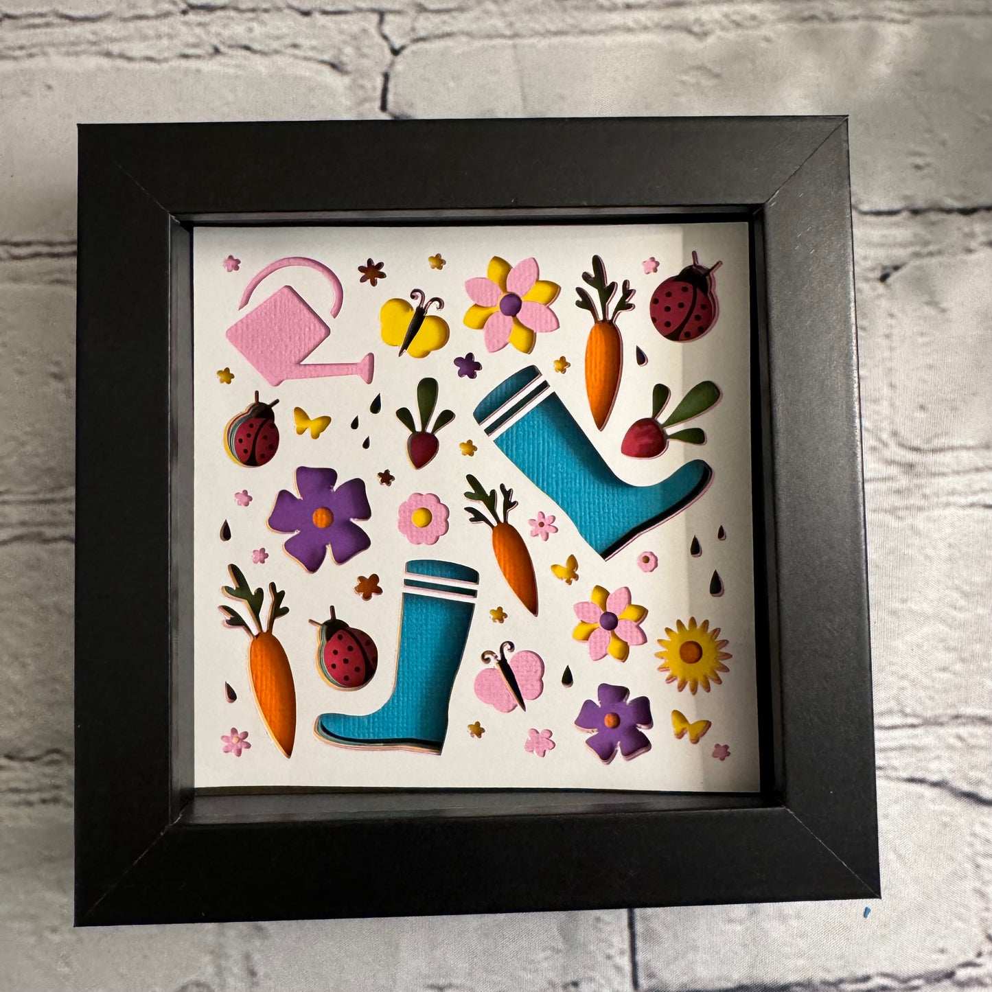 Gardening playful collage scene mini 3D paper art in a shadowbox