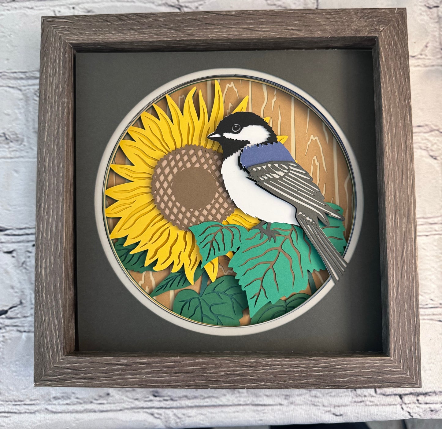 Chickadee on a sunflower 3D paper art in a shadowbox