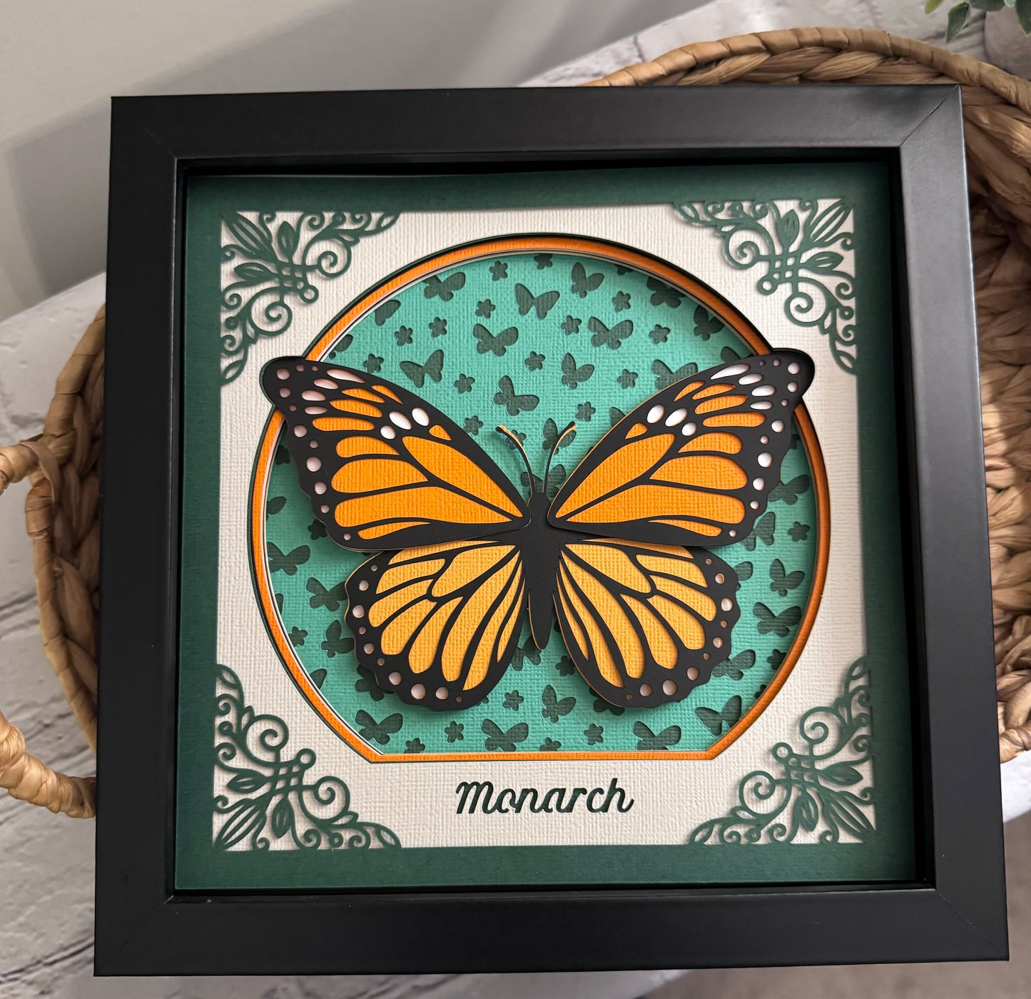 Intricate frame monarch butterfly 3D paper art in a shadowbox