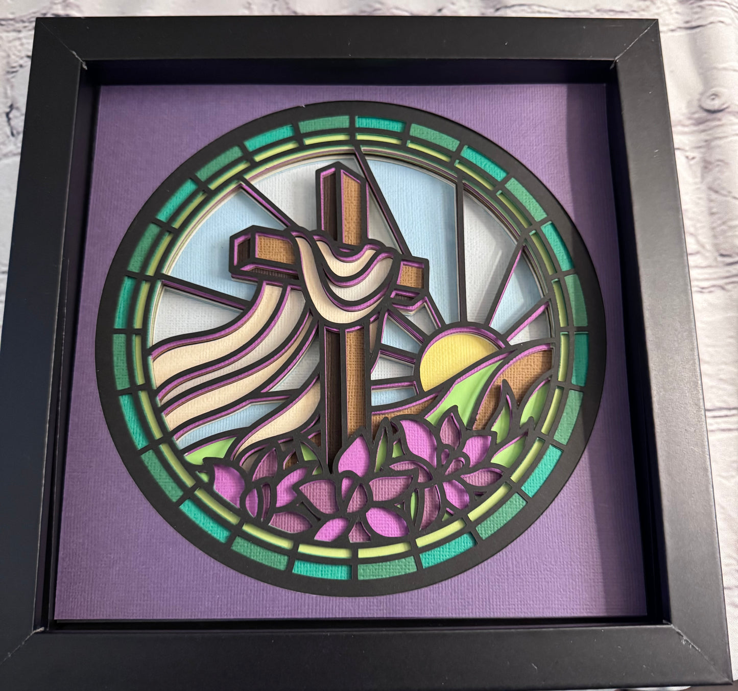 Stained glass cross on a hill 3D paper art in a shadowbox