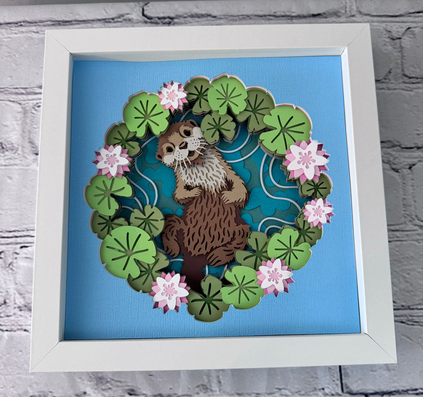 Otter with water lily design 3D paper art in a shadowbox