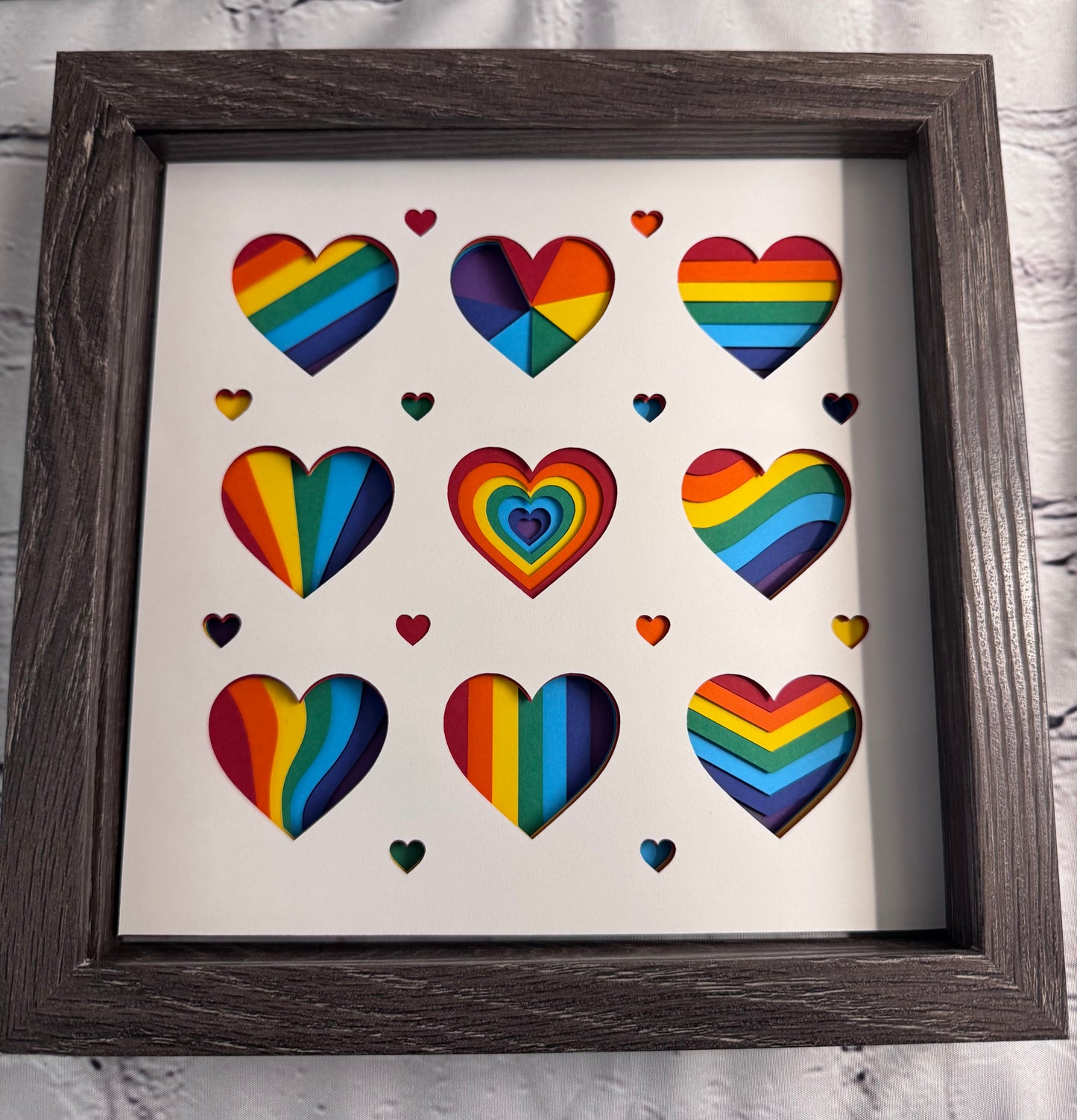Rainbow hearts pride 3D paper art in a shadowbox
