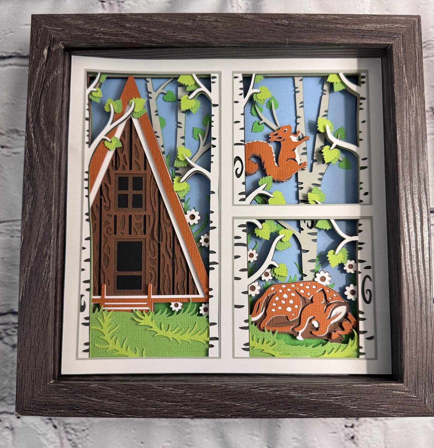 Spring cabin with fawn 3D paper art in a shadowbox