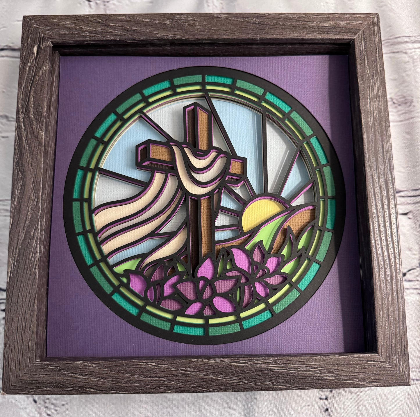 Stained glass cross on a hill 3D paper art in a shadowbox