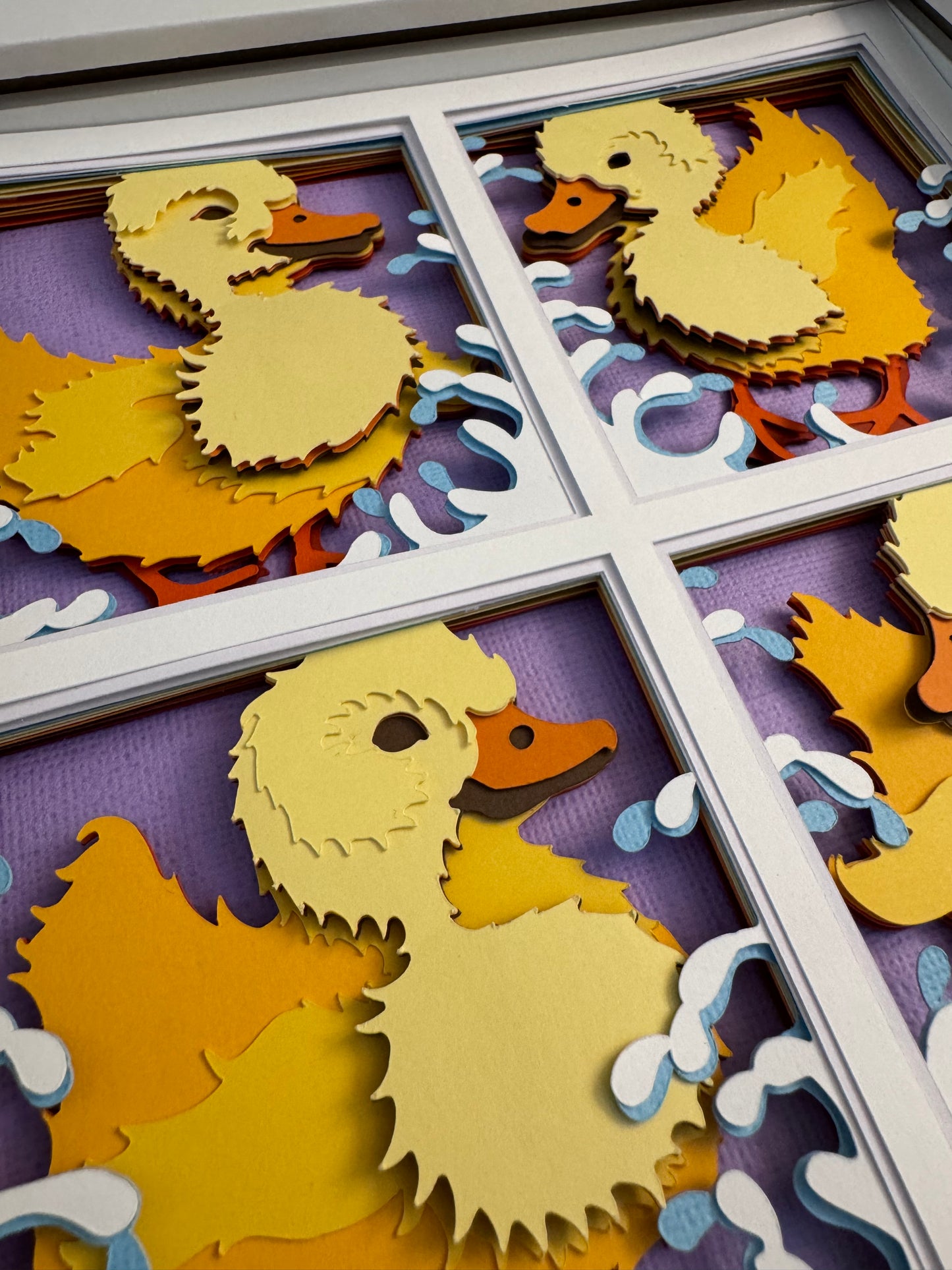 Ducklings in four panels 3D paper art in a shadowbox