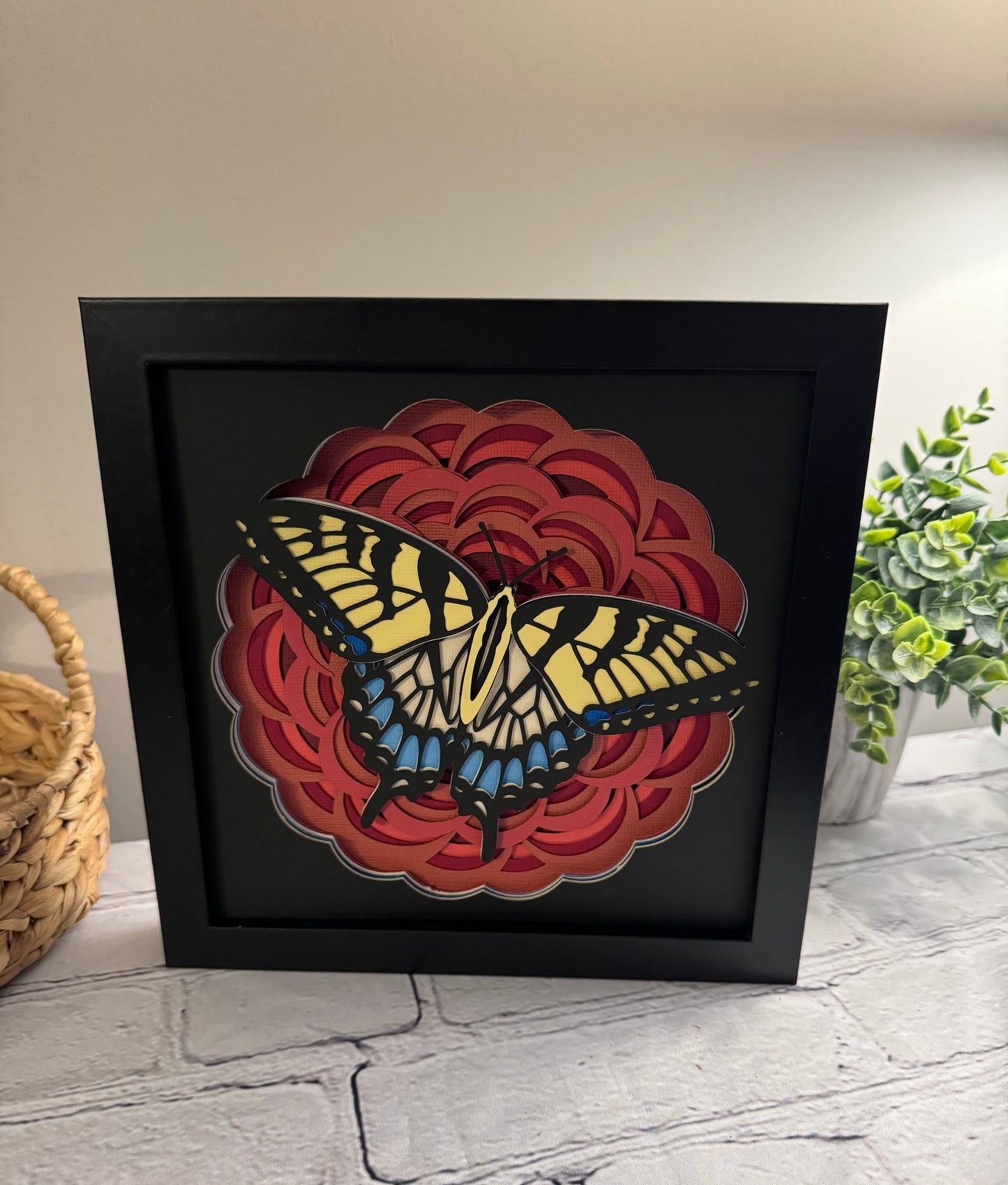 Red flower with blue and yellow butterfly 3D paper art in a shadowbox