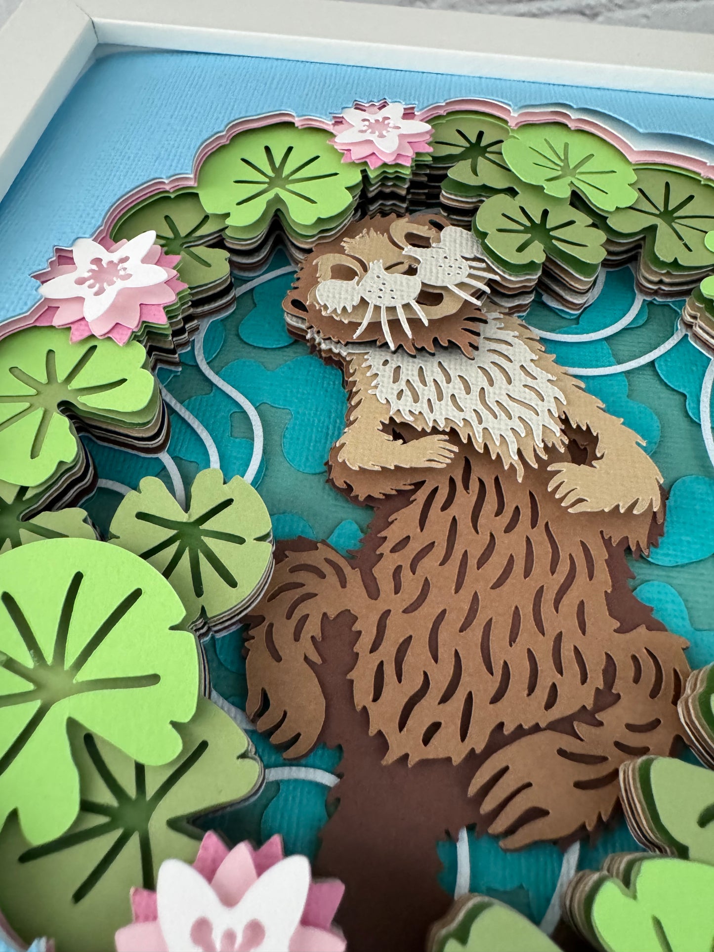Otter with water lily design 3D paper art in a shadowbox