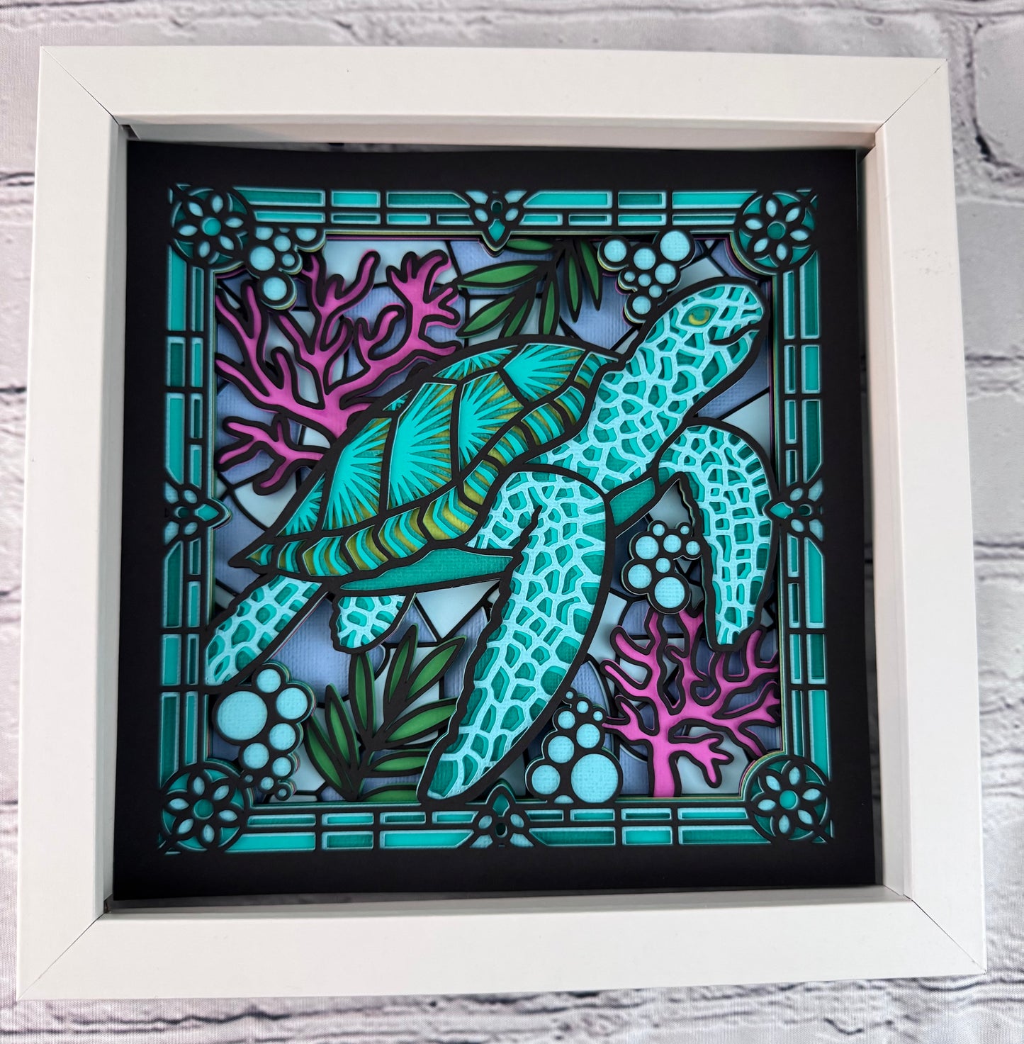 Stained glass sea turtle 3D paper art in a shadowbox