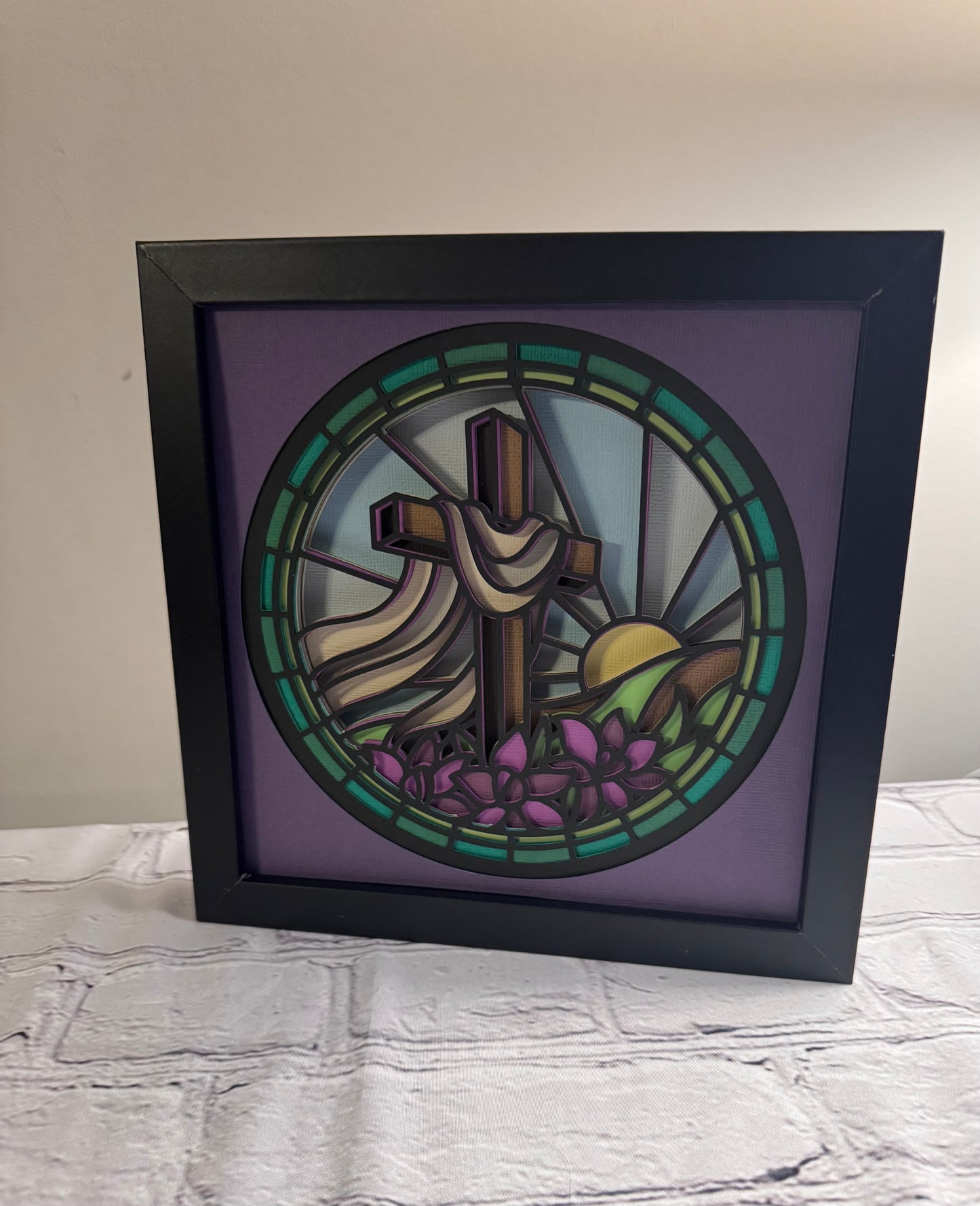 Stained glass cross on a hill 3D paper art in a shadowbox