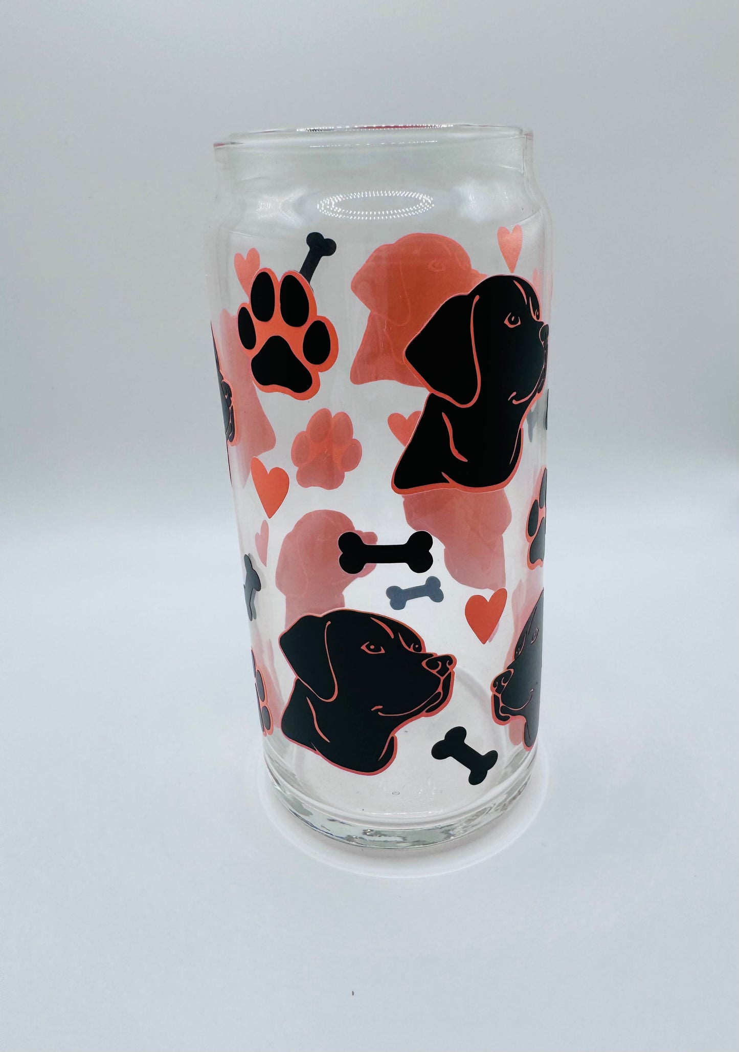 Labrador faces beer can glass