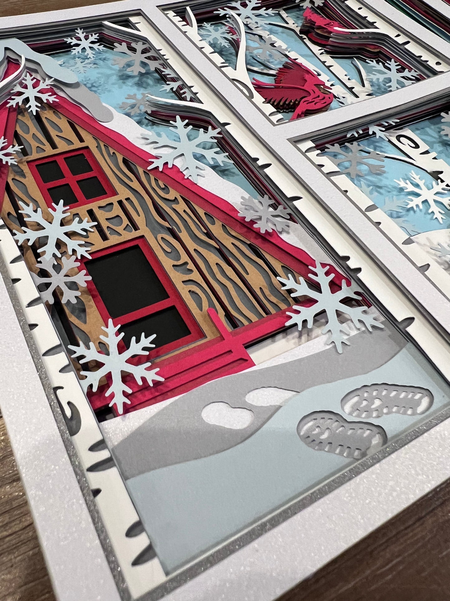 Winter cabin with cardinals 3D paper art in a shadowbox