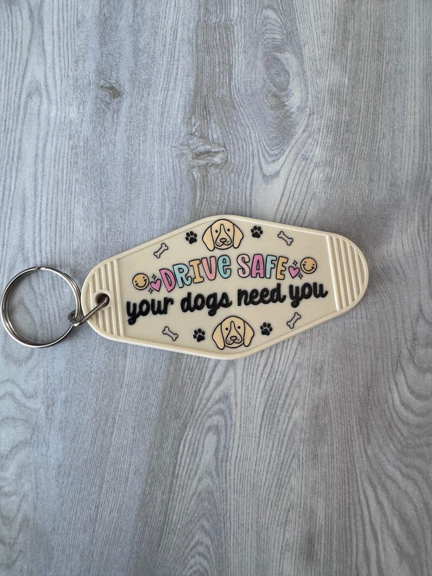 Drive safe, your dogs need you retro motel keychain