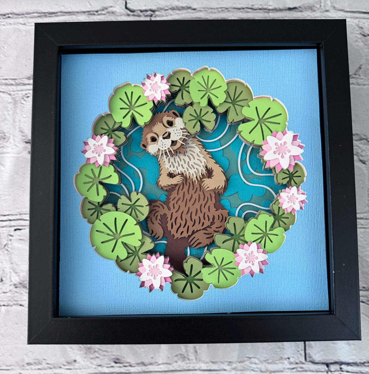 Otter with water lily design 3D paper art in a shadowbox