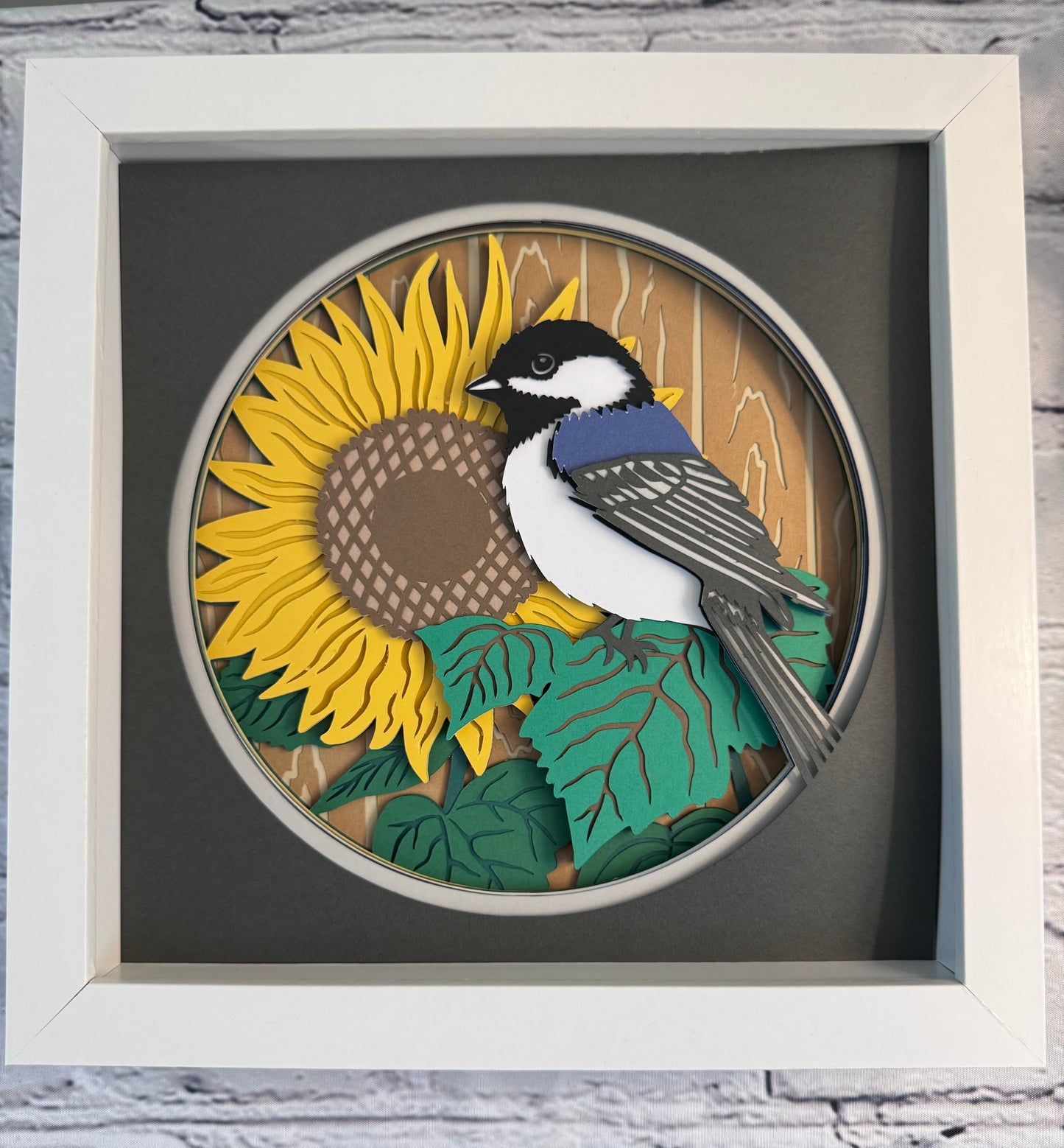 Chickadee on a sunflower 3D paper art in a shadowbox