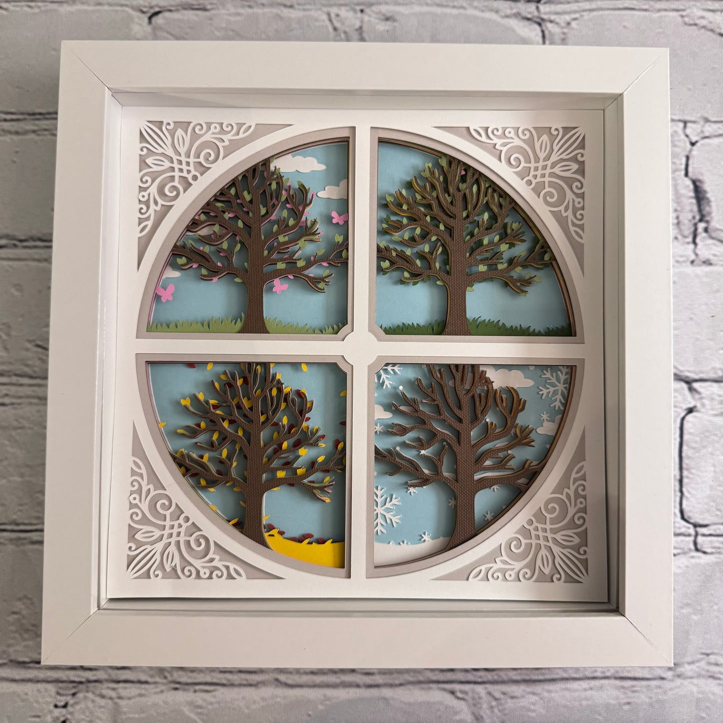 Intricate frame four seasons trees 3D paper art in a shadowbox