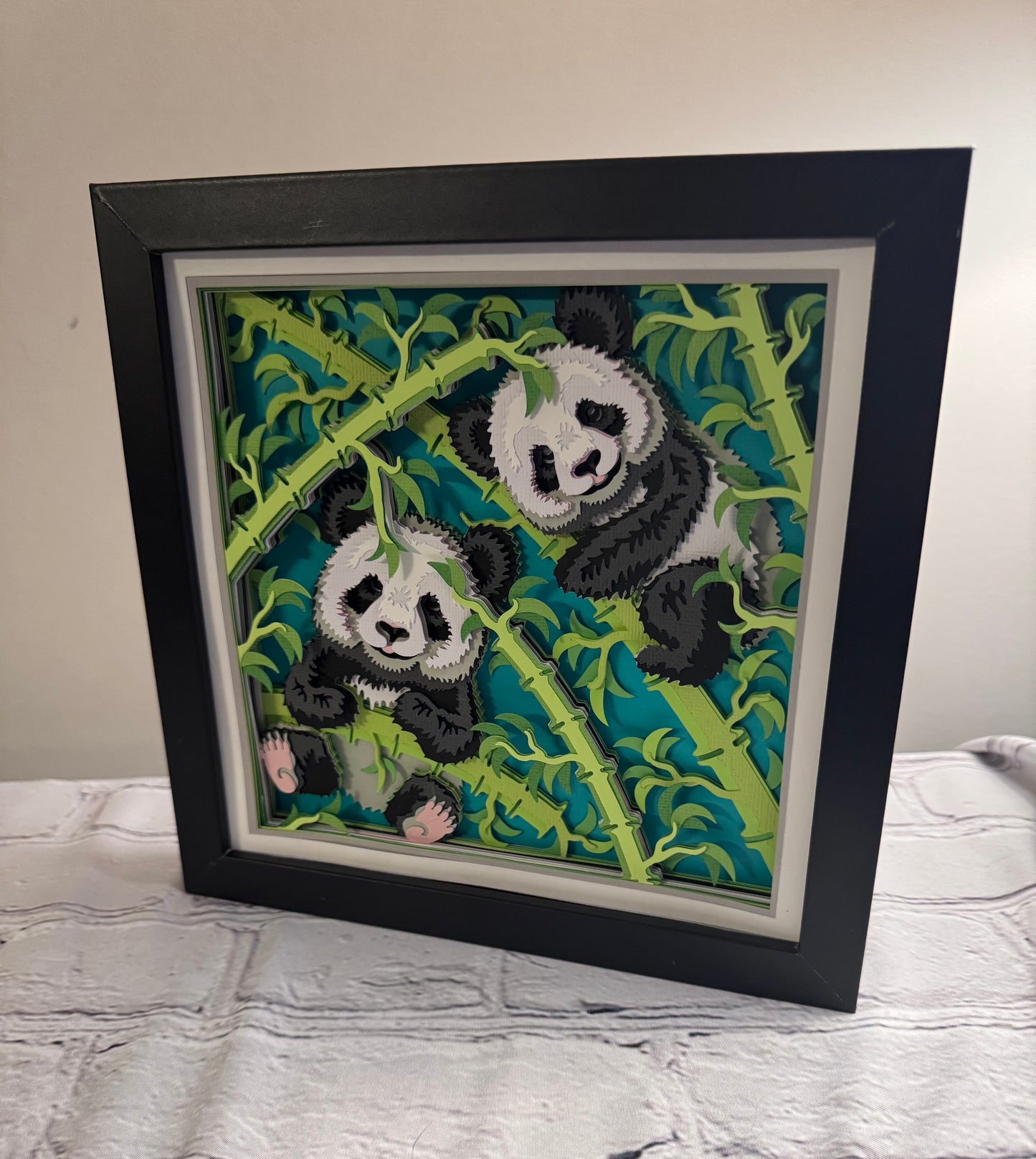 Pandas in bamboo 3D paper art shadowbox