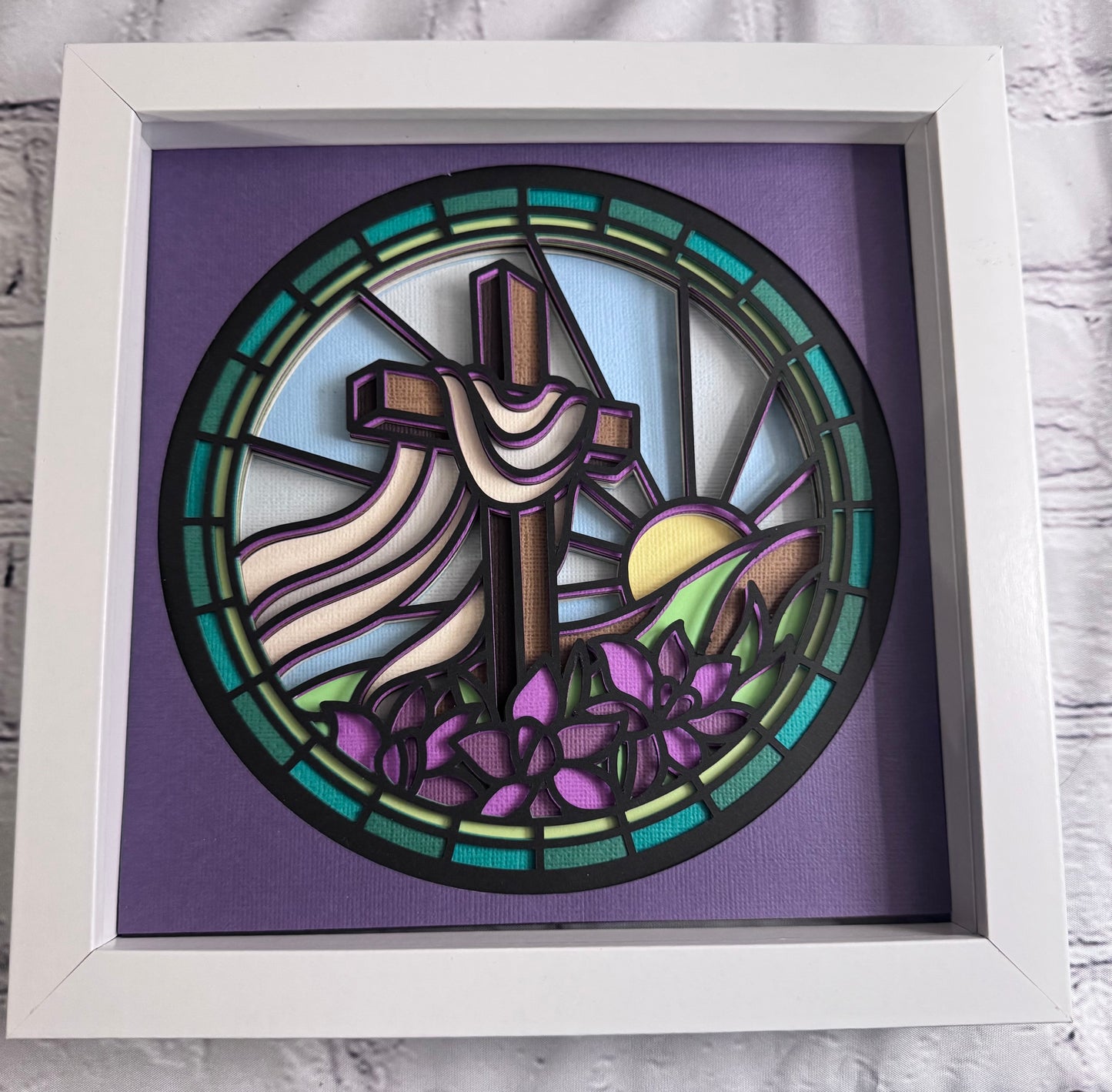 Stained glass cross on a hill 3D paper art in a shadowbox
