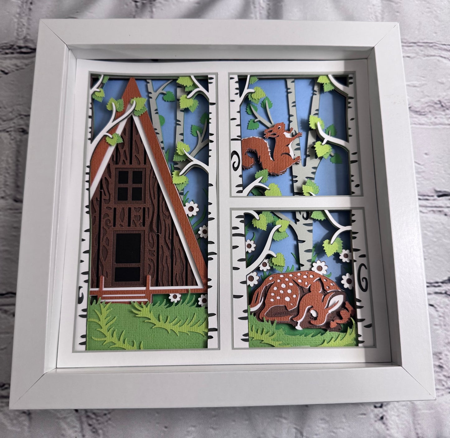 Spring cabin with fawn 3D paper art in a shadowbox
