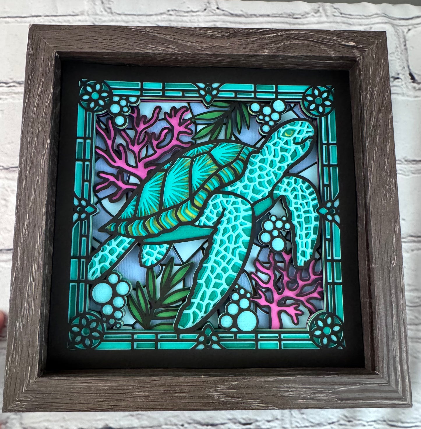 Stained glass sea turtle 3D paper art in a shadowbox