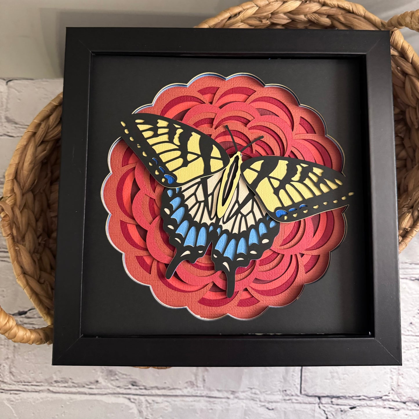 Red flower with blue and yellow butterfly 3D paper art in a shadowbox