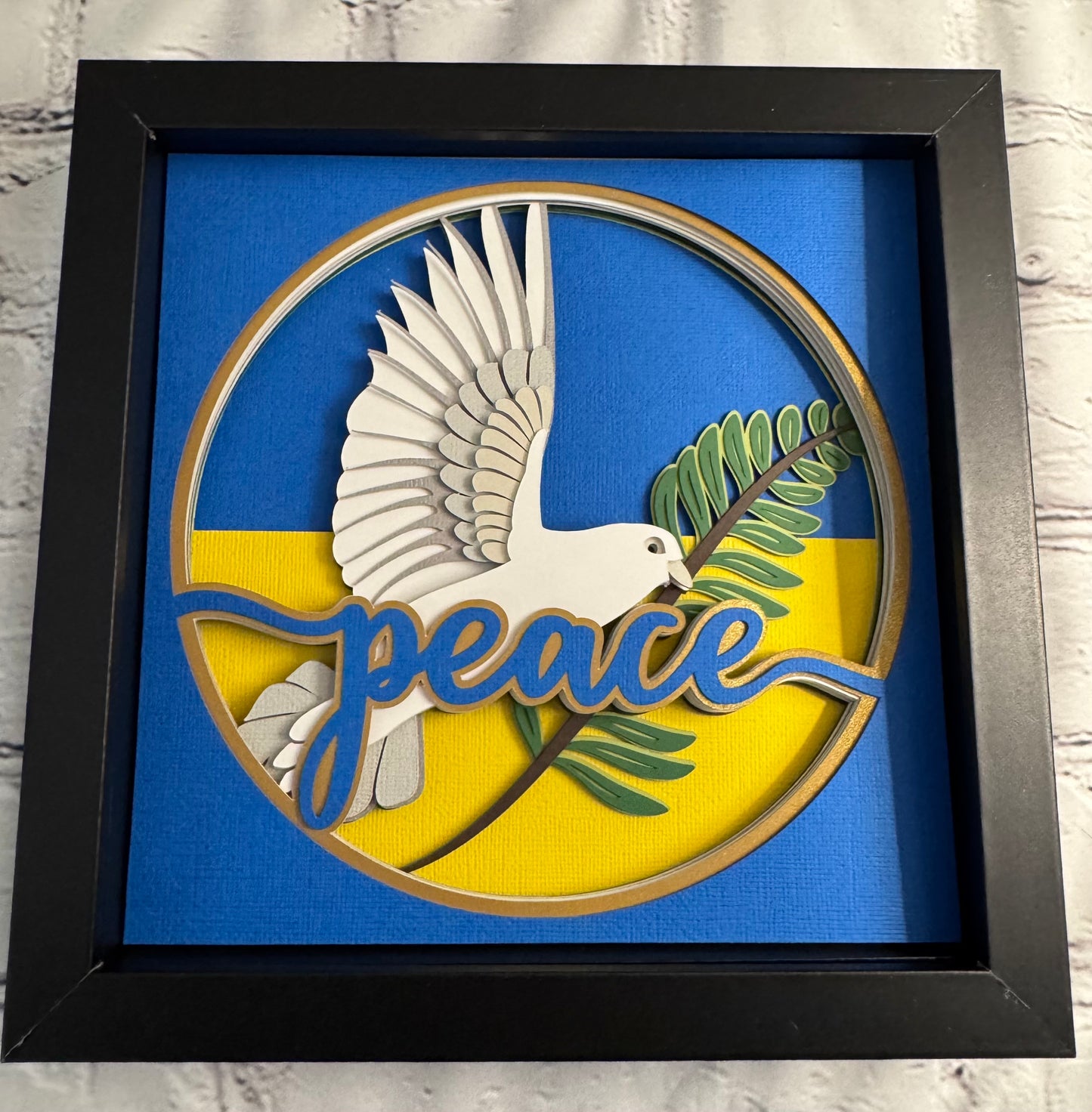 Ukraine peace dove 3D paper art in a shadowbox