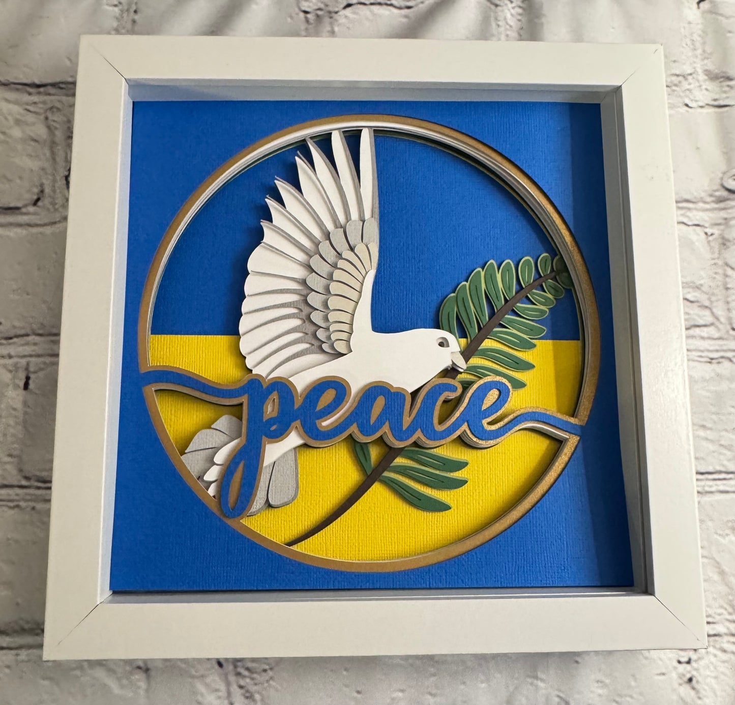Ukraine peace dove 3D paper art in a shadowbox