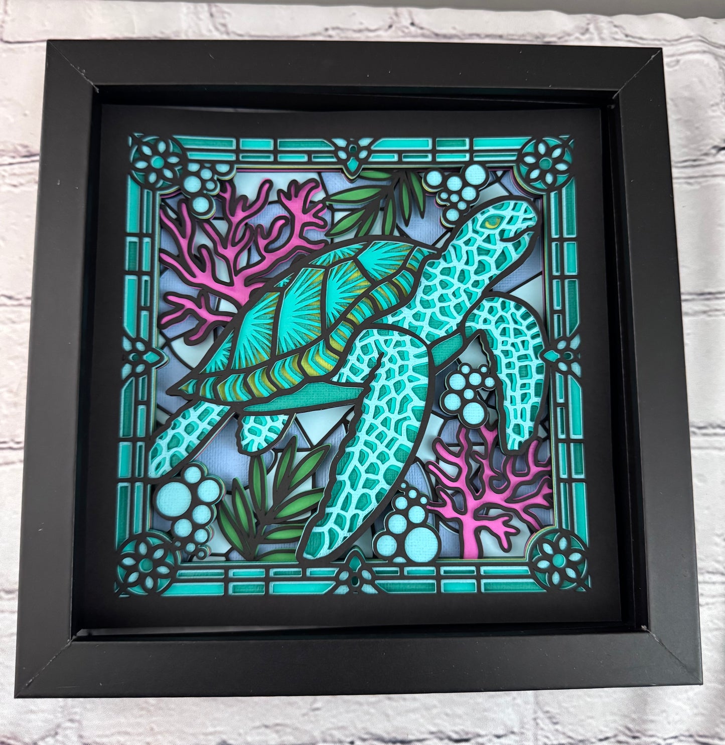 Stained glass sea turtle 3D paper art in a shadowbox