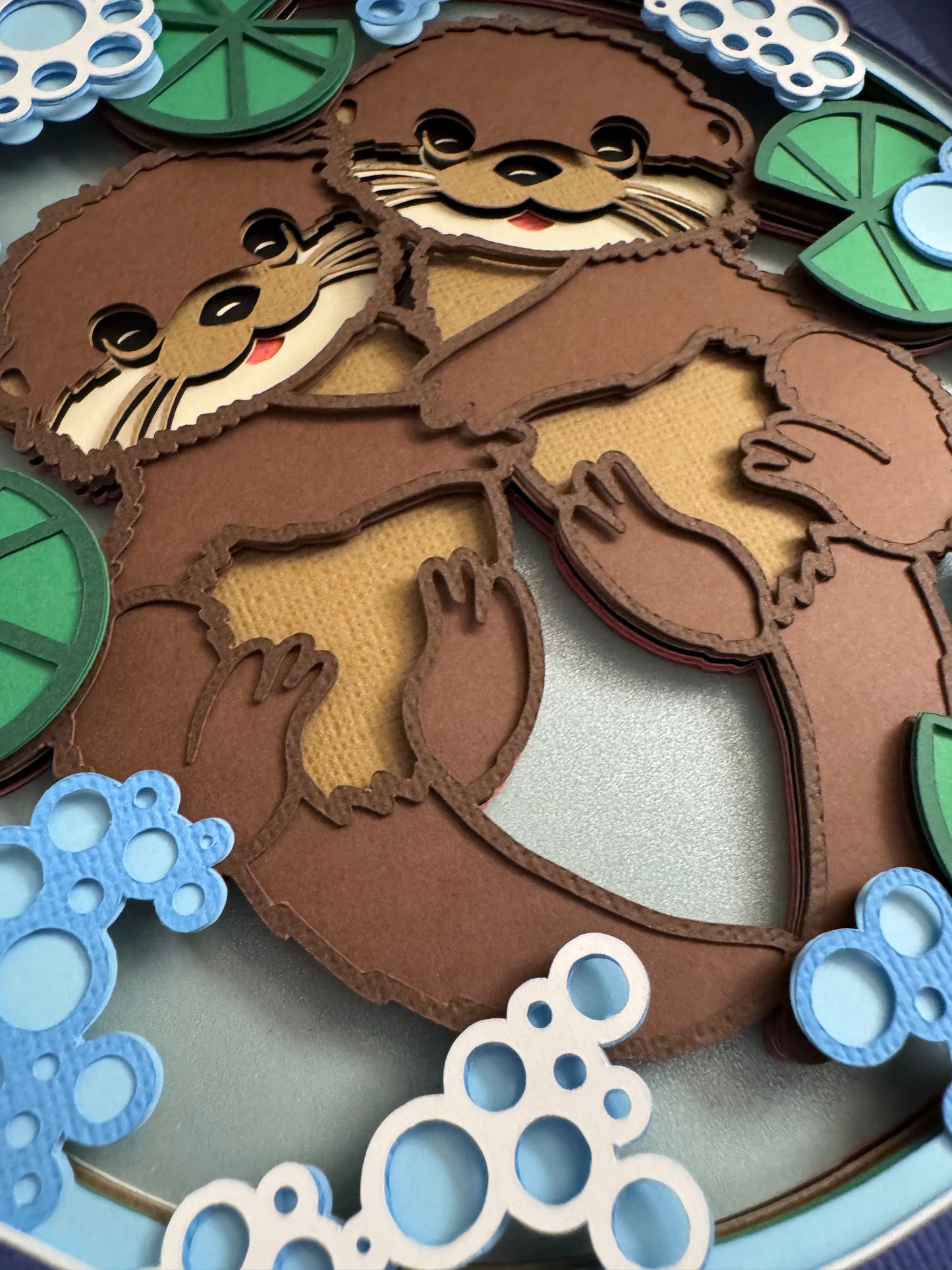 Otter couple 3D paper art in a shadowbox