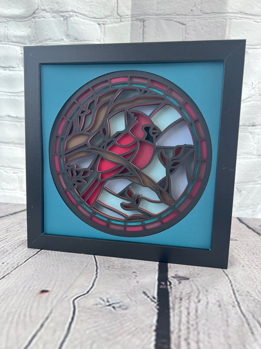 Stained glass cardinal 3D paper art in a shadowbox