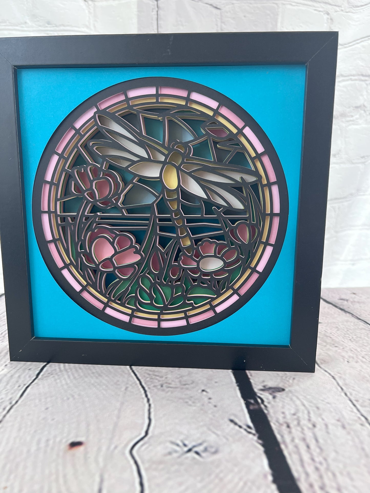 Stained glass dragonfly 3D paper art in a shadowbox