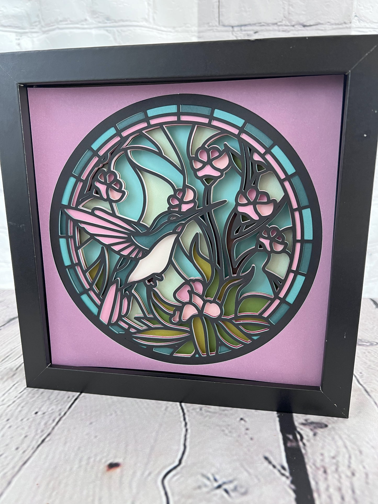 Stained glass hummingbird 3D paper art in a shadowbox