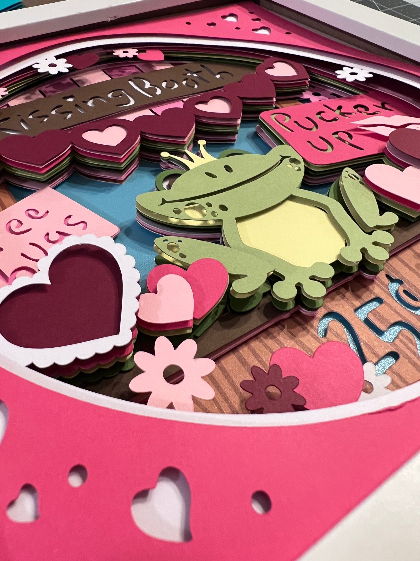 Kissing booth 3D paper art in a shadowbox