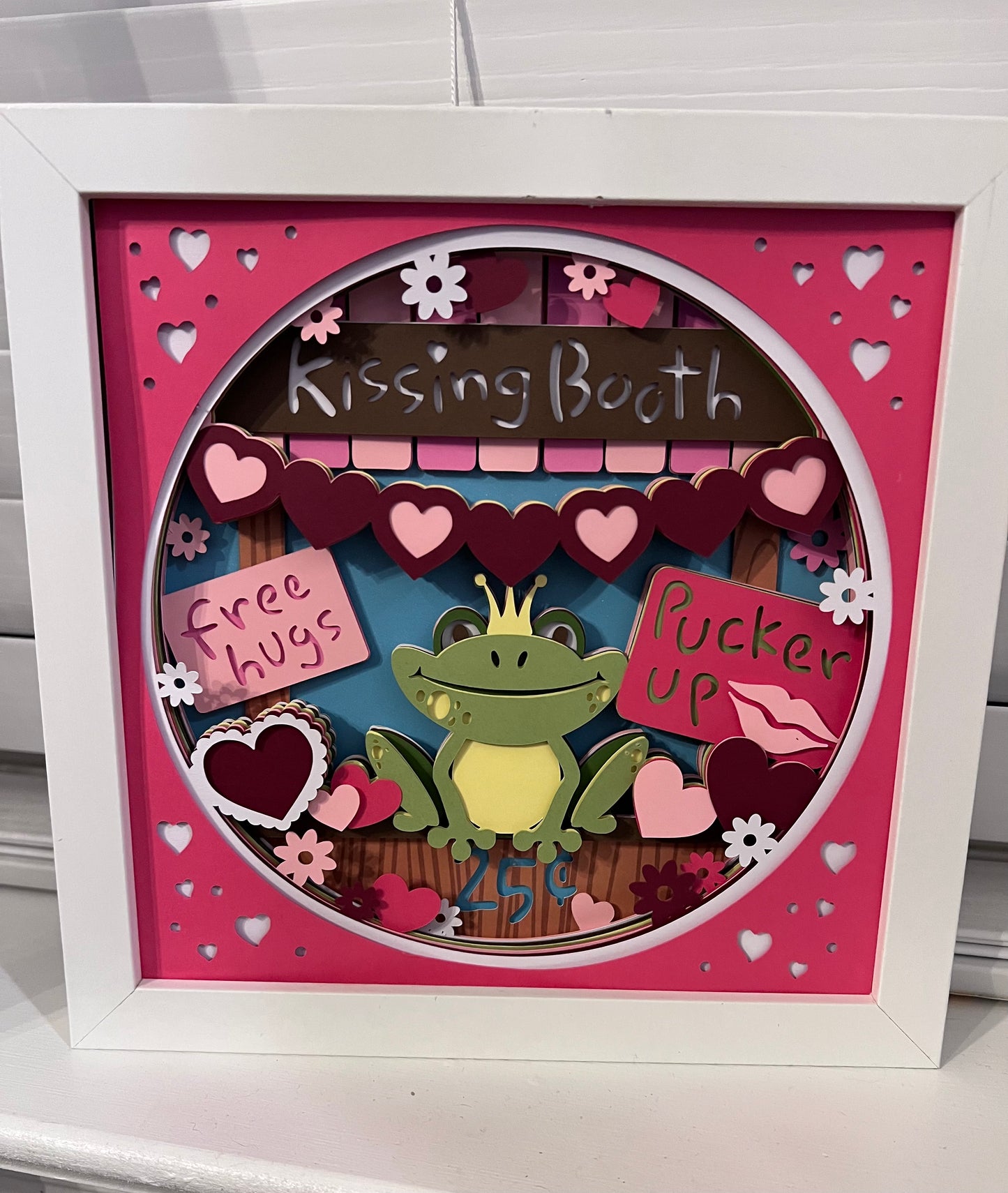 Kissing booth 3D paper art in a shadowbox