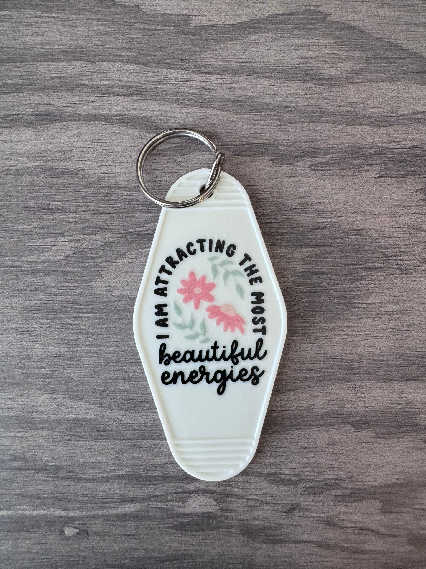 I am attracting the most beautiful energies retro motel keychain