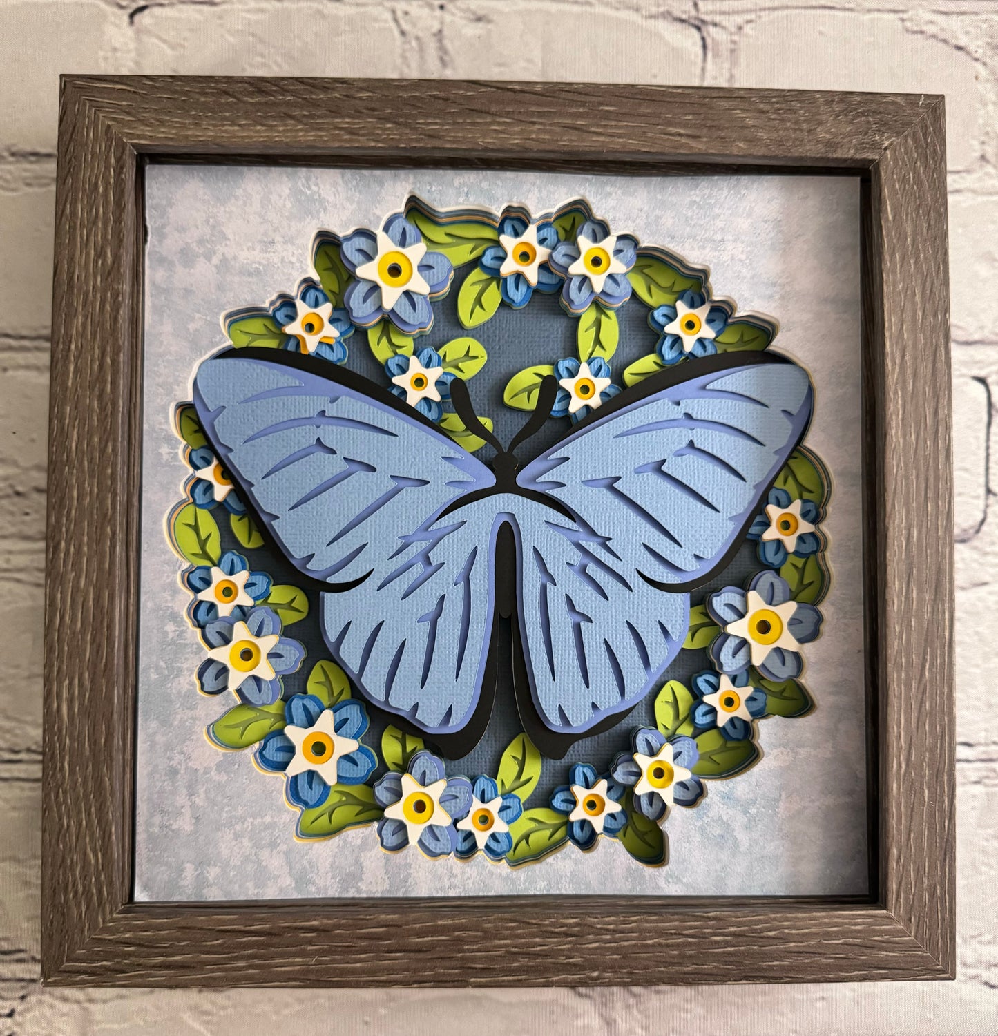 Butterfly solo scene blue morpho butterfly 3D paper art in a shadowbox