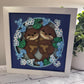 Otter couple 3D paper art in a shadowbox