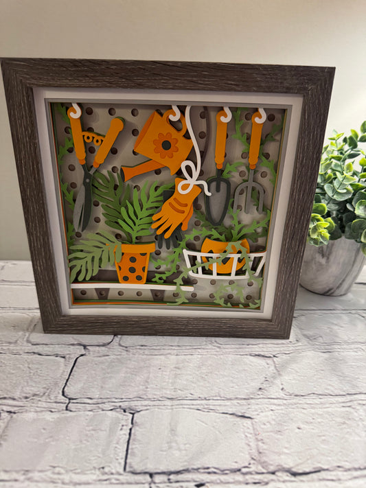 Gardening scene board with tools 3D paper art in a shadowbox