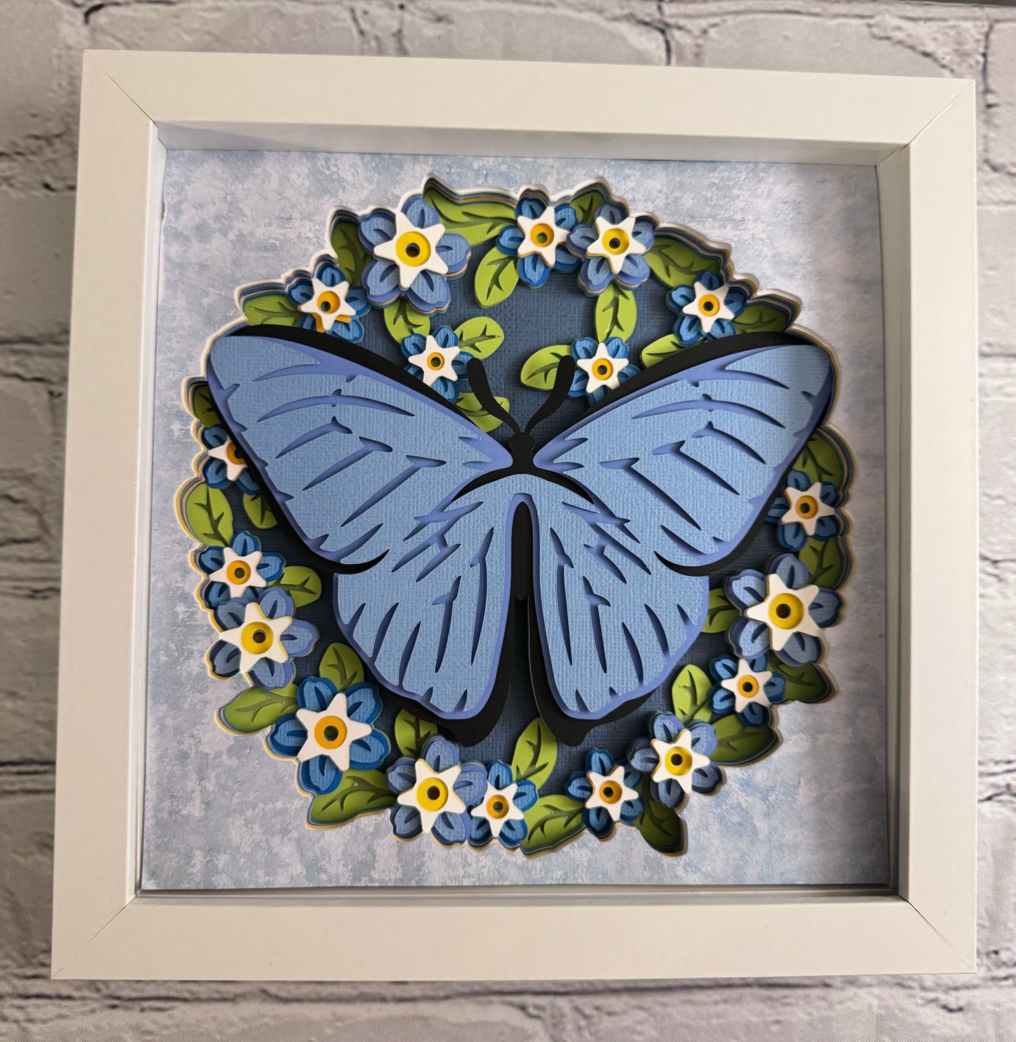 Butterfly solo scene blue morpho butterfly 3D paper art in a shadowbox