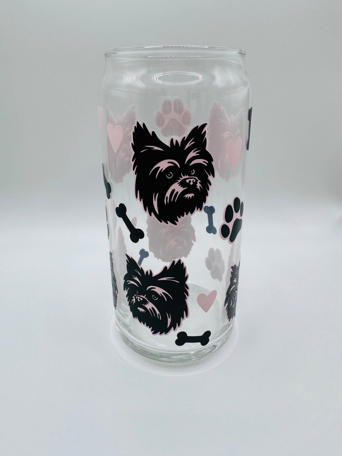 Yorkie faces beer can glass