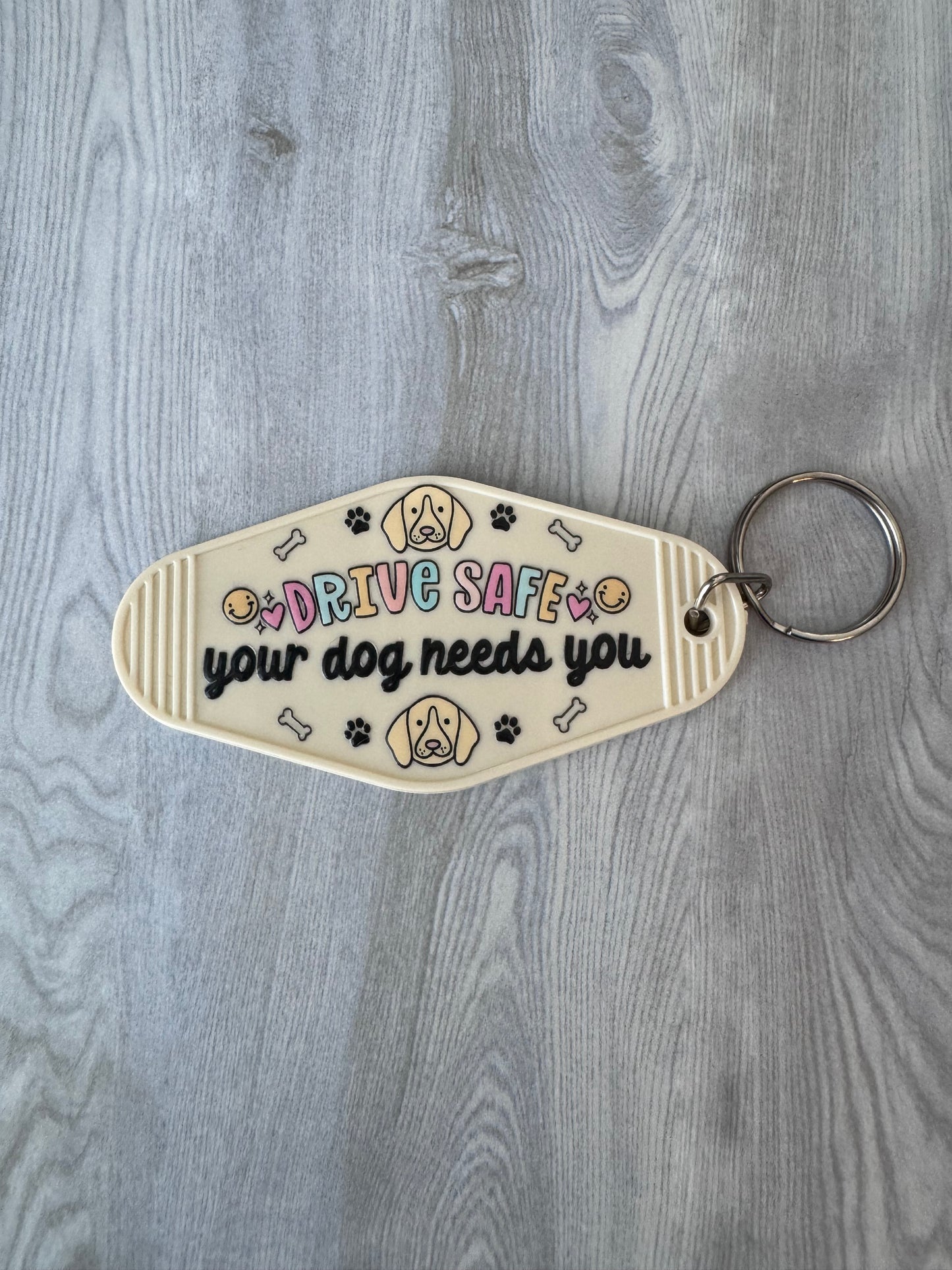 Drive safe, your dog needs you retro motel keychain