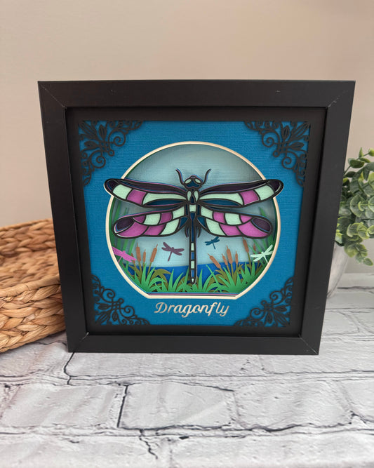 Intricate frame dragonfly 3D paper art in a shadowbox