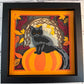 Black cat on a pumpkin 3D paper art in a shadowbox