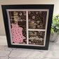 Spring porch scene with blanket 3D paper art in a shadowbox