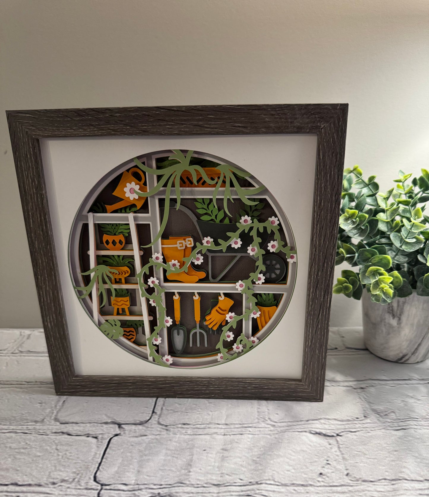 Gardening scene round version 3D paper art in a shadowbox