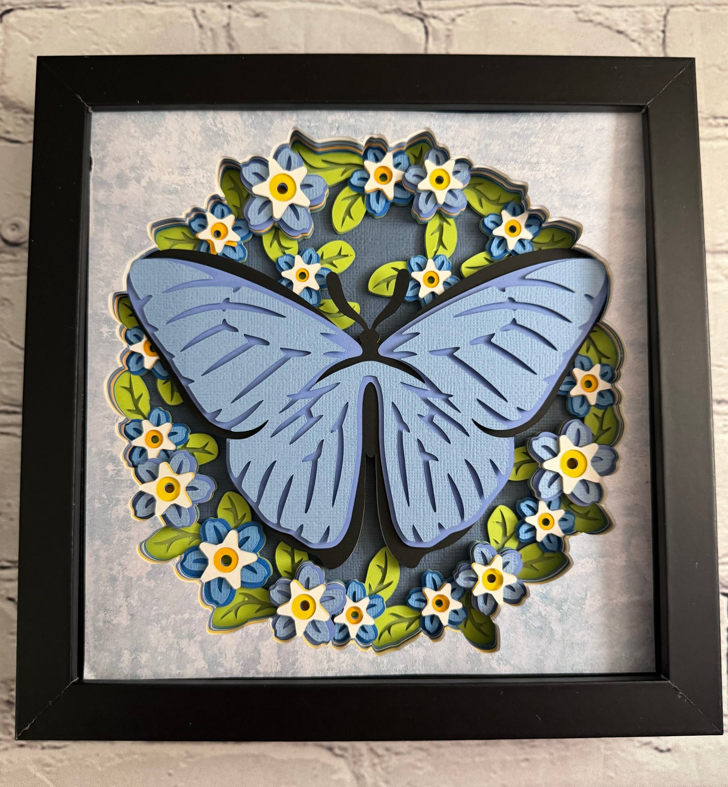 Butterfly solo scene blue morpho butterfly 3D paper art in a shadowbox