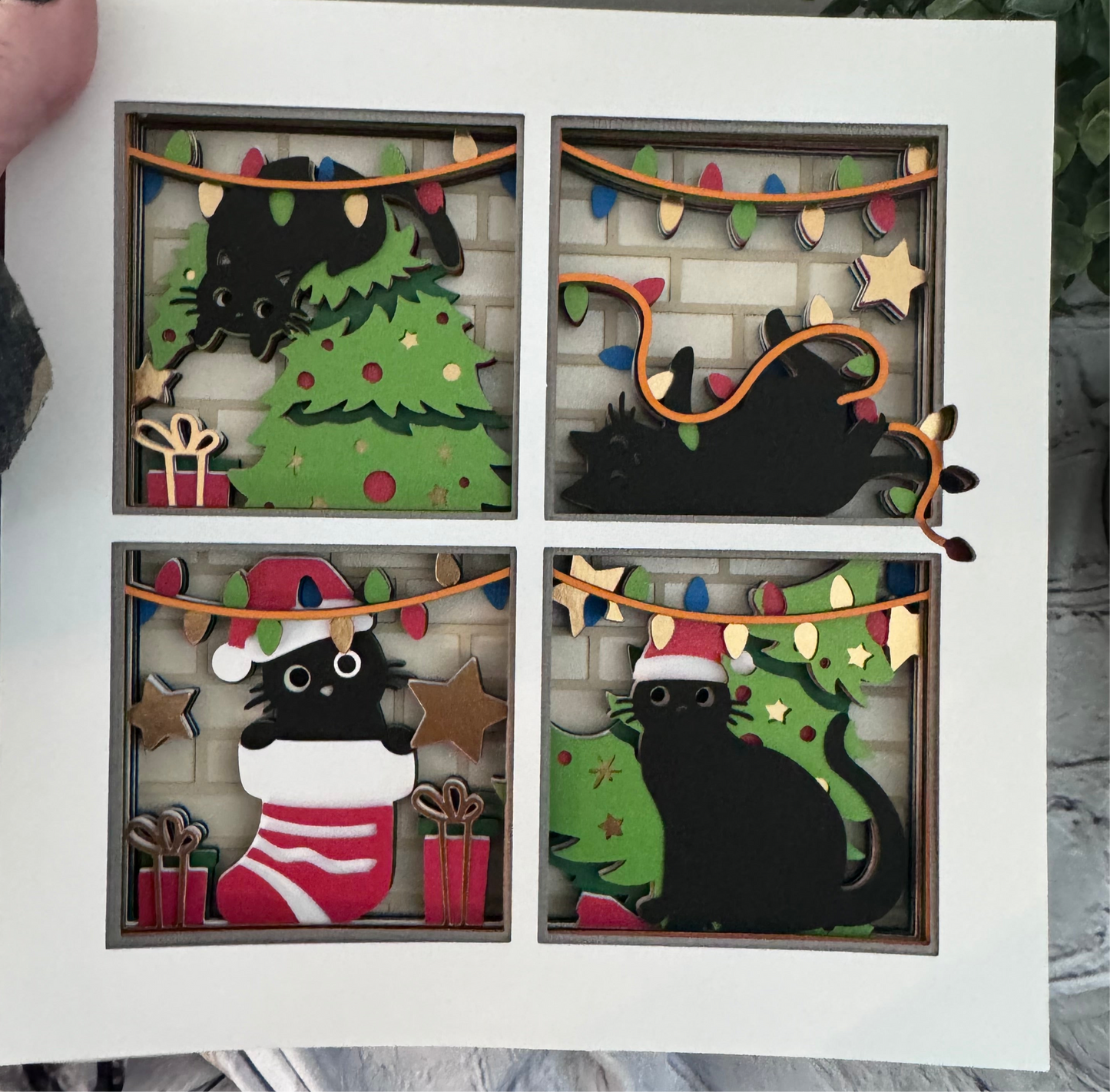 Christmas black cat causing trouble 3D paper art in a shadowbox