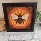Intricate frame bumble bee 3D paper art in a shadowbox