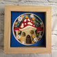 Mushroom house mini 3D paper art in a shadowbox