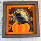 Black cat on a pumpkin 3D paper art in a shadowbox