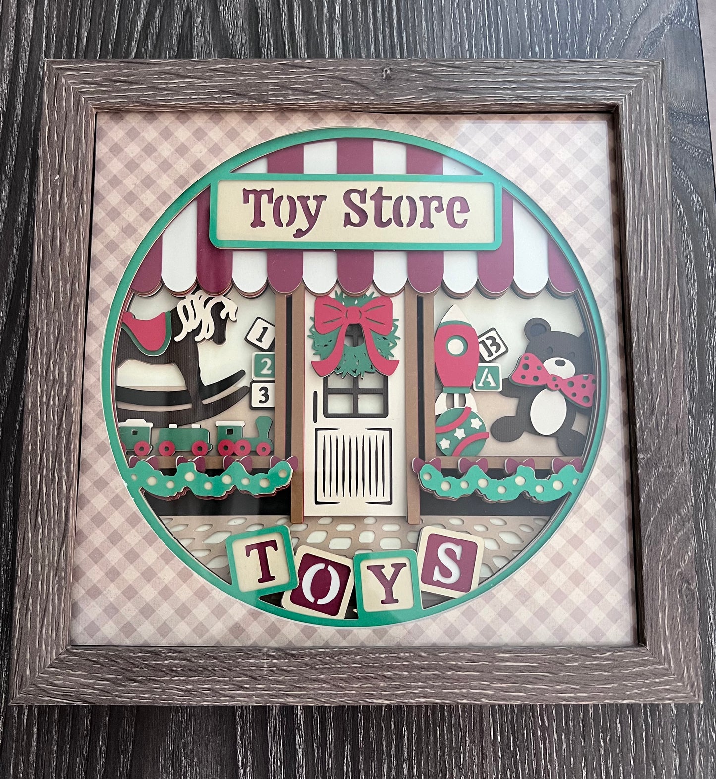 Toy store 3D paper art in a shadowbox